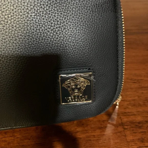 Brand new authentic cosmetic Versace case with 2 zipper compartments with handle
